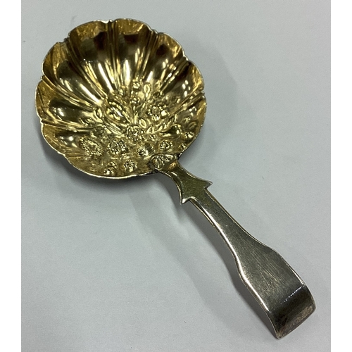 265 - A George III chased silver caddy spoon. Birmingham 1814. By Ledsam & Vale. Approx. 8 grams. Est. £60... 