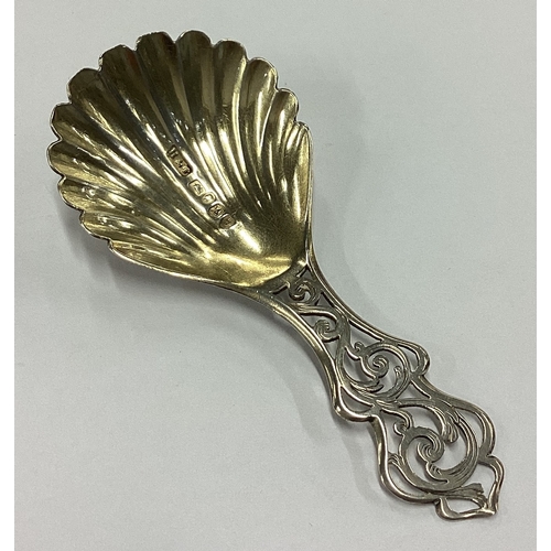 266 - A good Victorian silver fluted caddy spoon with pierced handle. Birmingham 1853. By Hilliard &Thomas... 