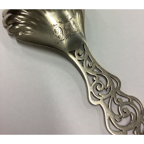 266 - A good Victorian silver fluted caddy spoon with pierced handle. Birmingham 1853. By Hilliard &Thomas... 