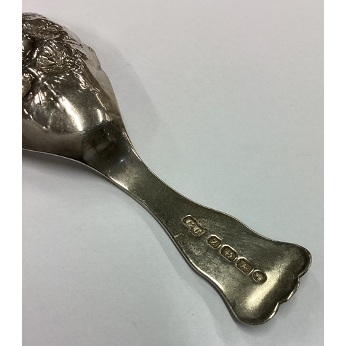 269 - A fine quality Victorian silver caddy spoon embossed with flowers and fine bright-cut decoration to ... 