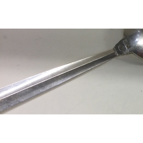 27 - GEORG JENSEN: A large Danish silver serving spoon. Marked verso. Approx. 64 grams. Est. £60 - £80.