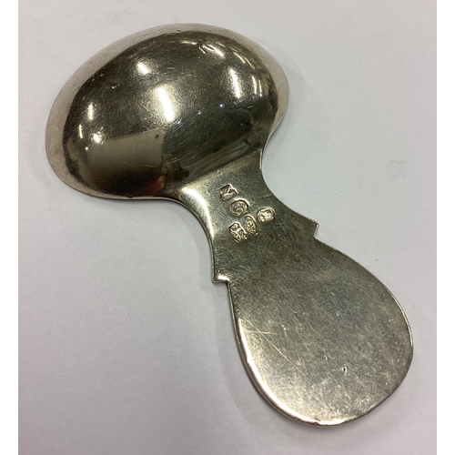 270 - An unusual George III silver caddy spoon with shell decoration to handle. Birmingham 1822. By Joseph... 