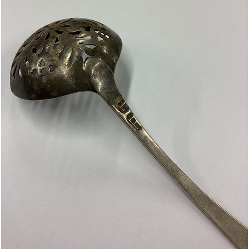 282 - NEWCASTLE: A rare 18th Century silver sifter spoon with pierced bowl. Maker's mark 'IL' struck twice... 