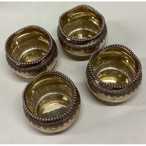 286 - A good set of four silver gilt salts with beadwork border. London. Approx. 200 grams. Est. £100 - £1... 