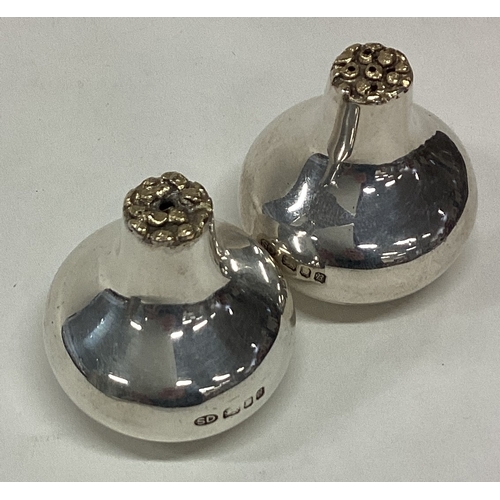 289 - STUART DEVLIN: A good silver and silver gilt condiment set of textured form together with original b... 