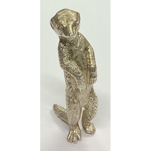 304 - A heavy cast figure of a meerkat. London. By JR. Approx. 40 grams. Est. £30 - £50.