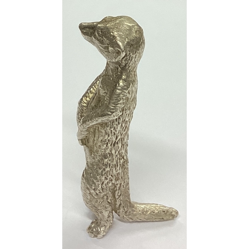 304 - A heavy cast figure of a meerkat. London. By JR. Approx. 40 grams. Est. £30 - £50.