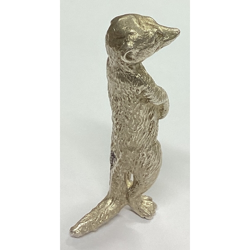 304 - A heavy cast figure of a meerkat. London. By JR. Approx. 40 grams. Est. £30 - £50.