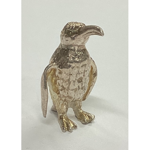 309 - A small cast silver figure of a penguin. Birmingham. Approx. 10 grams. Est. £30 - £50.