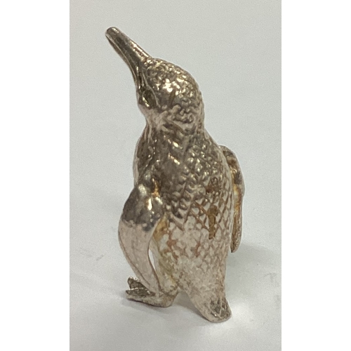 309 - A small cast silver figure of a penguin. Birmingham. Approx. 10 grams. Est. £30 - £50.