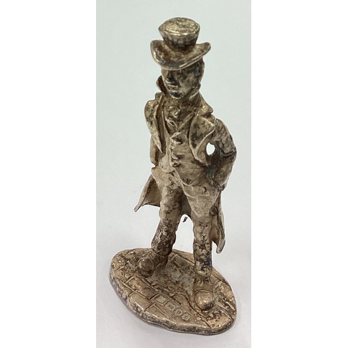 326 - A small silver figure of Charles Dickens' character 'Jarvis'. Approx. 20 grams. Est. £30 - £40.