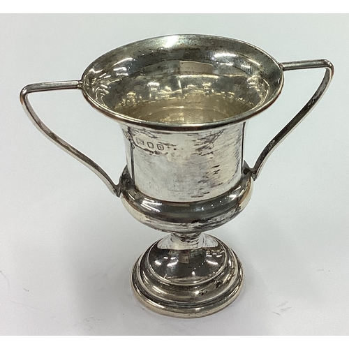 332 - A silver two-handled cup. Birmingham 1926. Approx. 19 grams. Est. £20 - £30.