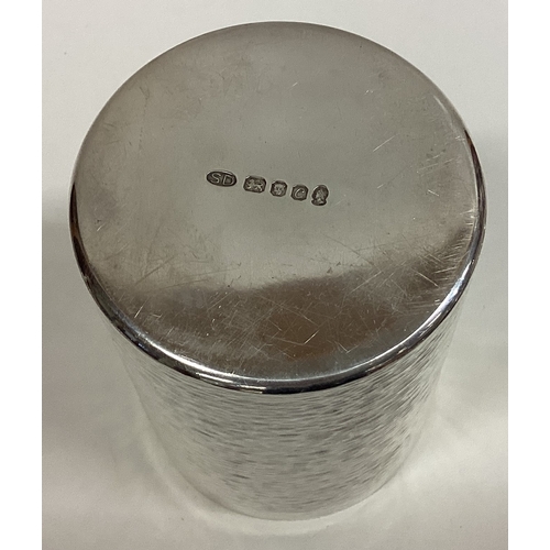 333 - STUART DEVLIN: A large contemporary silver beaker of hammered design. London 1977. Approx. 232 grams... 