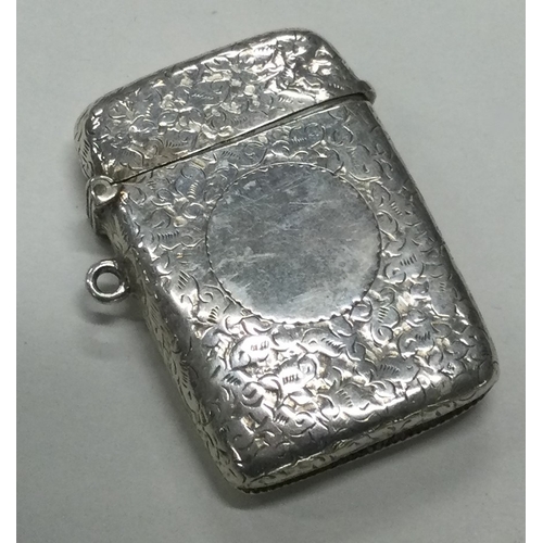 34 - A Victorian silver vesta case with engraved decoration. London 1897. Approx. 29 grams. Est. £30 - £5... 