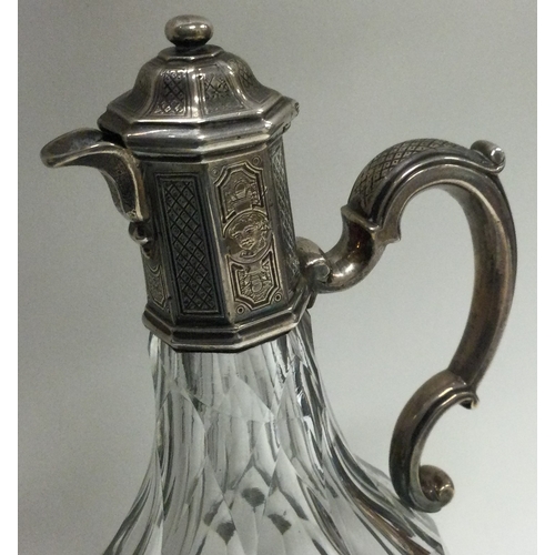 340 - PAUL DE LAMARIE: A rare 18th Century silver vinegar jug. Est. £200 - £300.