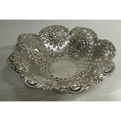 343 - A Victorian silver pierced dish embossed with flowers. Sheffield 1897. By M Bros. Approx. 58 grams. ... 