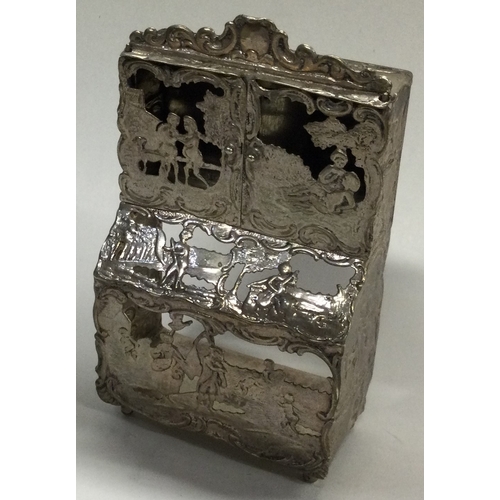 352 - A 19th Century Dutch silver toy cupboard with hinged cover. Marked to base. Approx. 67 grams. Est. £... 