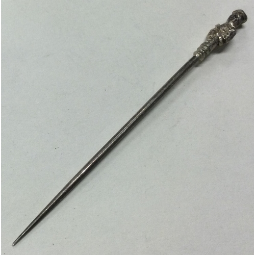 374 - A Chinese silver cocktail stirrer. Marked Sterling. Approx. 6 grams. Est. £10 - £20.