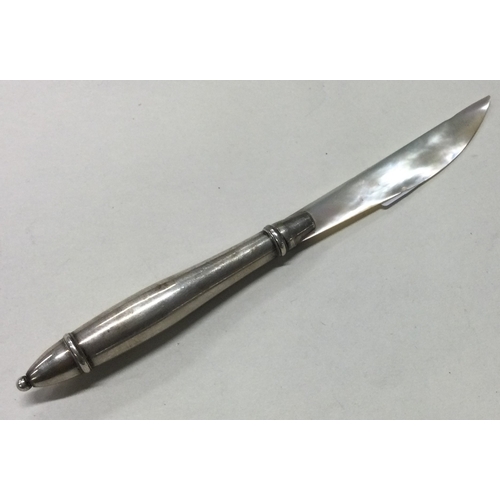 376 - A silver and MOP letter opener. Birmingham 1908. Approx. 6 grams. Est. £10 - £20.