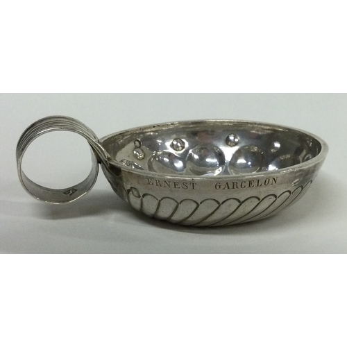 40 - A 19th Century French silver wine taster. Marked to handle. Approx. 46 grams. Est. £60 - £80.