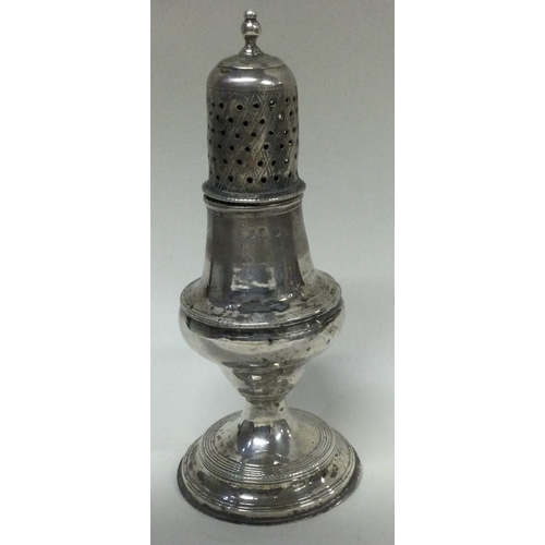 403 - An 18th Century George III silver sugar caster. Circa 1790. Approx. 77 grams. Est. £80 - £120.