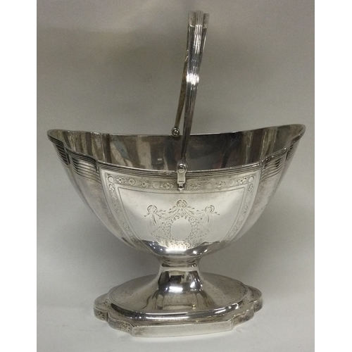 419 - EDINBURGH: A rare 18th Century Scottish silver swing handled basket with bright-cut decoration. 1796... 