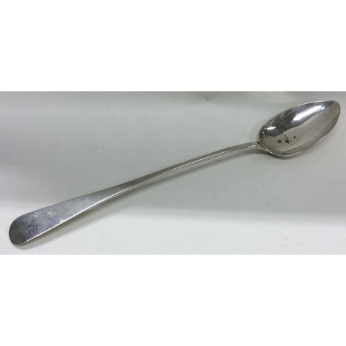 42 - EDINBURGH: A large George III Scottish silver basting spoon. 1811. By IM. Approx. 94 grams. Est. £10... 