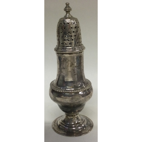 428 - An 18th Century George III silver sugar caster. London 1769. By IS. Approx. 92 grams. Est. £100 - £1... 