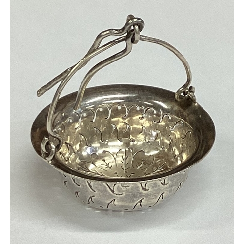 434 - A 19th Century French silver tea strainer. Marked to side. Approx. 15 grams. Est. £20 - £30.