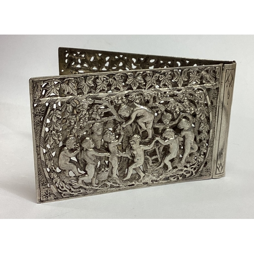 438 - A pierced Antique silver case embossed with cherubs and vines. Approx. 72 grams. Est. £80 - £120.