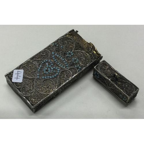 44 - A 19th Century filigree silver card case. Approx. 48 grams. Est. £60 - £80.