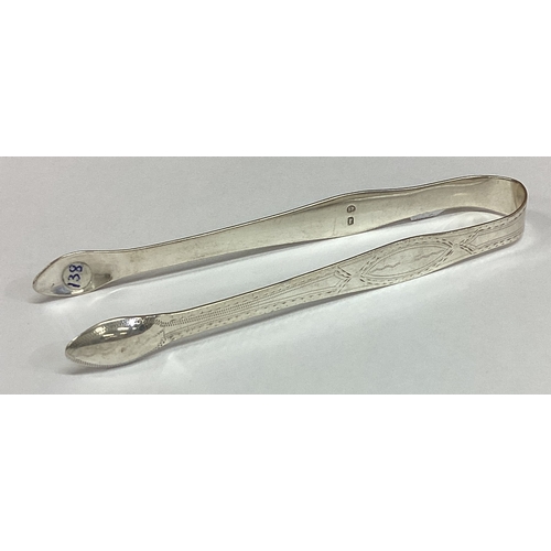 446 - HESTER BATEMAN: A pair of silver sugar tongs. London circa 1790. Approx. 32 grams. Est. £50 - £80.