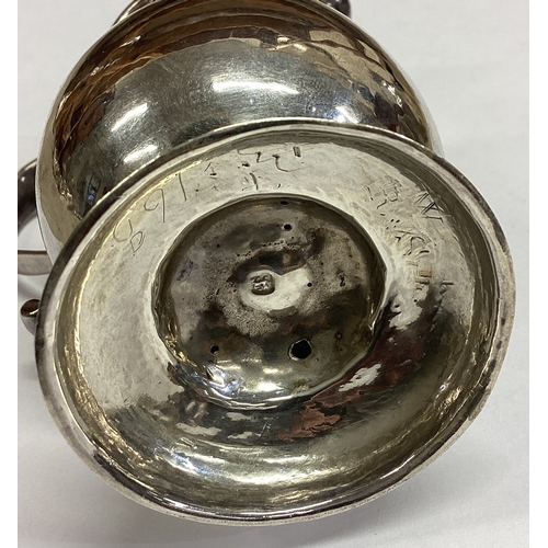 478 - An 18th Century George II silver pitcher / jug. Lion mark to base. Approx. 83 grams. Est. £200 - £30... 