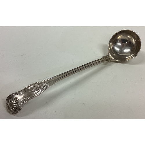 561 - A George III silver toddy ladle. London. By WC. Approx. 50 grams. Est. £30 - £50.