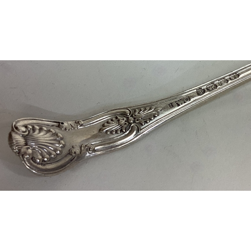 561 - A George III silver toddy ladle. London. By WC. Approx. 50 grams. Est. £30 - £50.