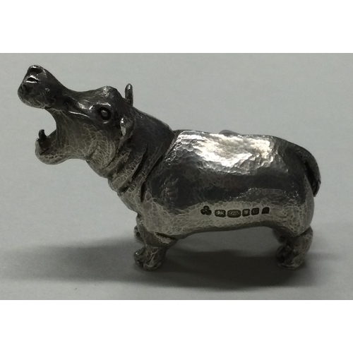 57 - A heavy silver figure of a hippopotamus. London 2002. Approx. 127 grams. Est. £150 - £200.