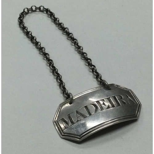 61 - An 18th Century silver decanter label for 'Madeira'. London 1795. Approx. 8 grams. Est. £30 - £50.