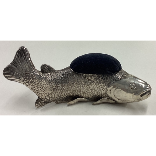 615 - A large 19th Century silver articulated fish pin cushion. Marked to base. Approx. 156 grams of gross... 