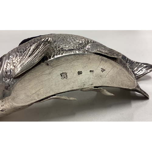 615 - A large 19th Century silver articulated fish pin cushion. Marked to base. Approx. 156 grams of gross... 