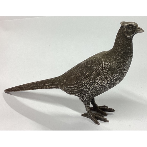 65 - A E JONES: A heavy cast silver figure of a pheasant with textured body. Birmingham. Approx. 156 gram... 