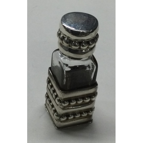 72 - A large silver scent bottle with beaded decoration. Marked 925 to base. Approx. 51 grams of gross we... 