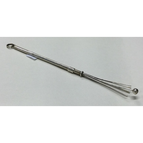 89 - A silver collapsible swizzle stick. Approx. 6 grams. Est. £20 - £30.