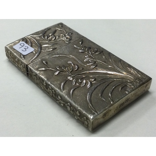 93 - WANG HING: A 19th Century Chinese chased silver card case embossed with flowers to lift-off cover. M... 