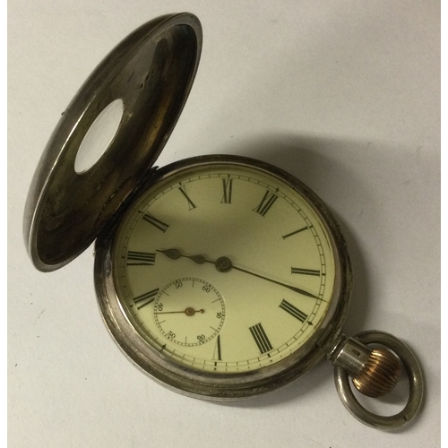 949 - OMEGA: A gent's silver Half Hunter pocket watch with white enamelled dial. Est. £150 - £200.