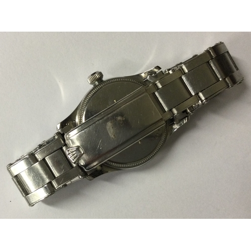 955 - TUDOR OYSTER: A good stainless steel midi sized wristwatch on strap. Numbered to watch 32760/4453. N... 