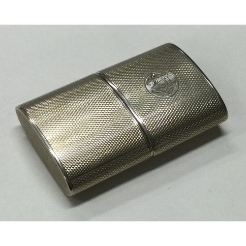 99 - An engine turned silver lighter. Approx. 38 grams. Est. £40 - £60.