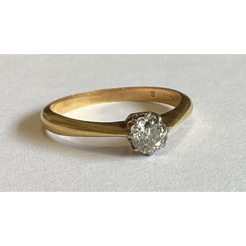 842 - An 18 carat gold mounted single stone ring in claw setting. Approx. 3 grams. Est. £80 - £120.