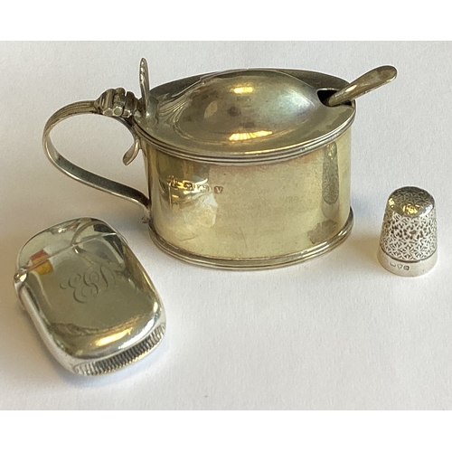 407 - A plain silver vesta case together with a mustard etc. Approx. 79 grams. Est. £30 - £40.