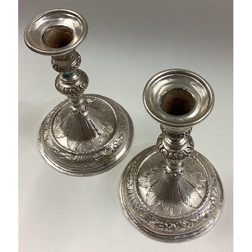 105 - A pair of 17th / 18th Century Queen Anne silver tapersticks. Circa 1700. Approx. 245 grams. Est. £60... 