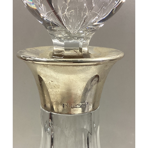 11 - A large silver mounted decanter with stopper. Birmingham. Est. £80 - £120.